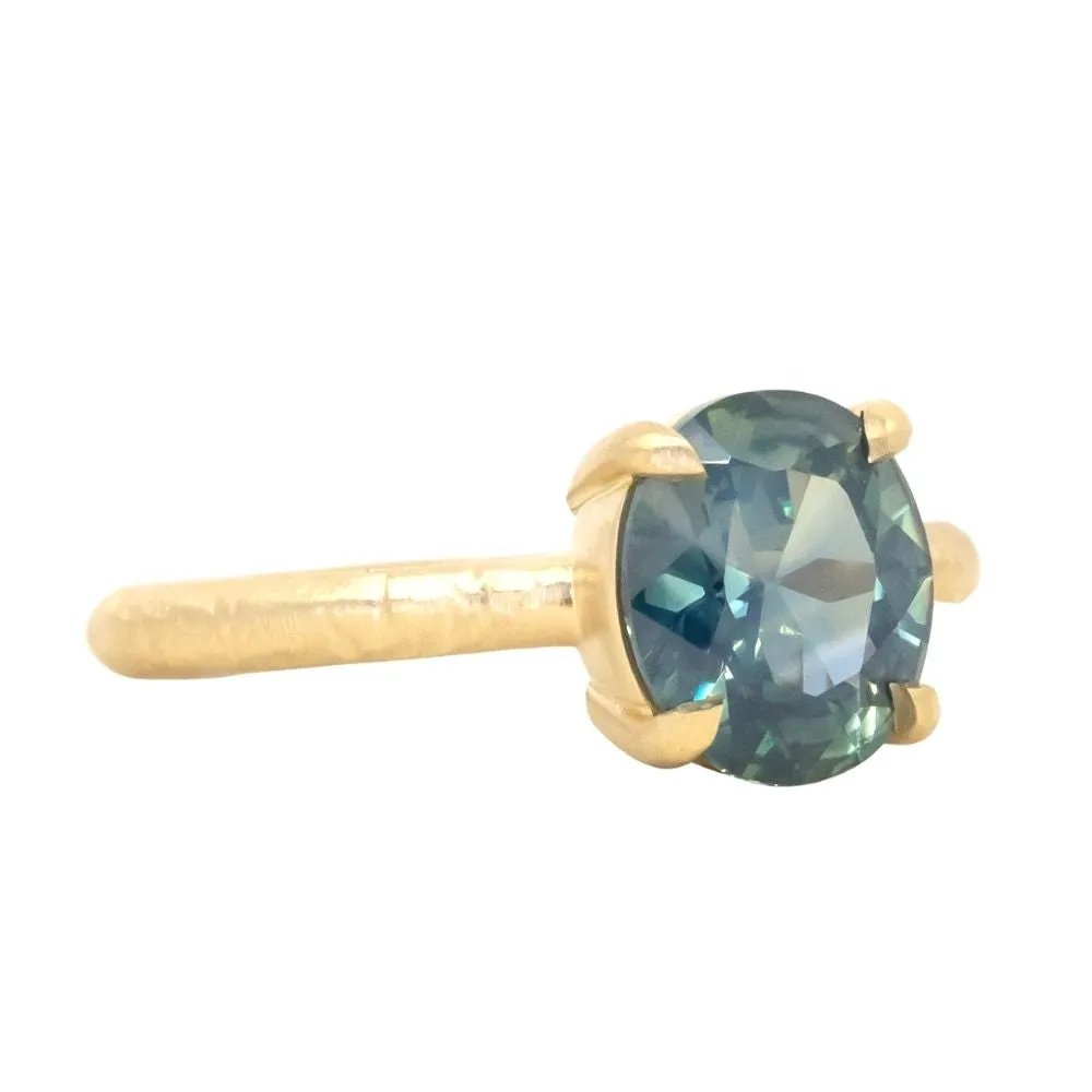 2.20ct Oval Silky Nigerian Sapphire Low Profile 4 Prong Evergreen Solitaire in 18k Yellow Gold