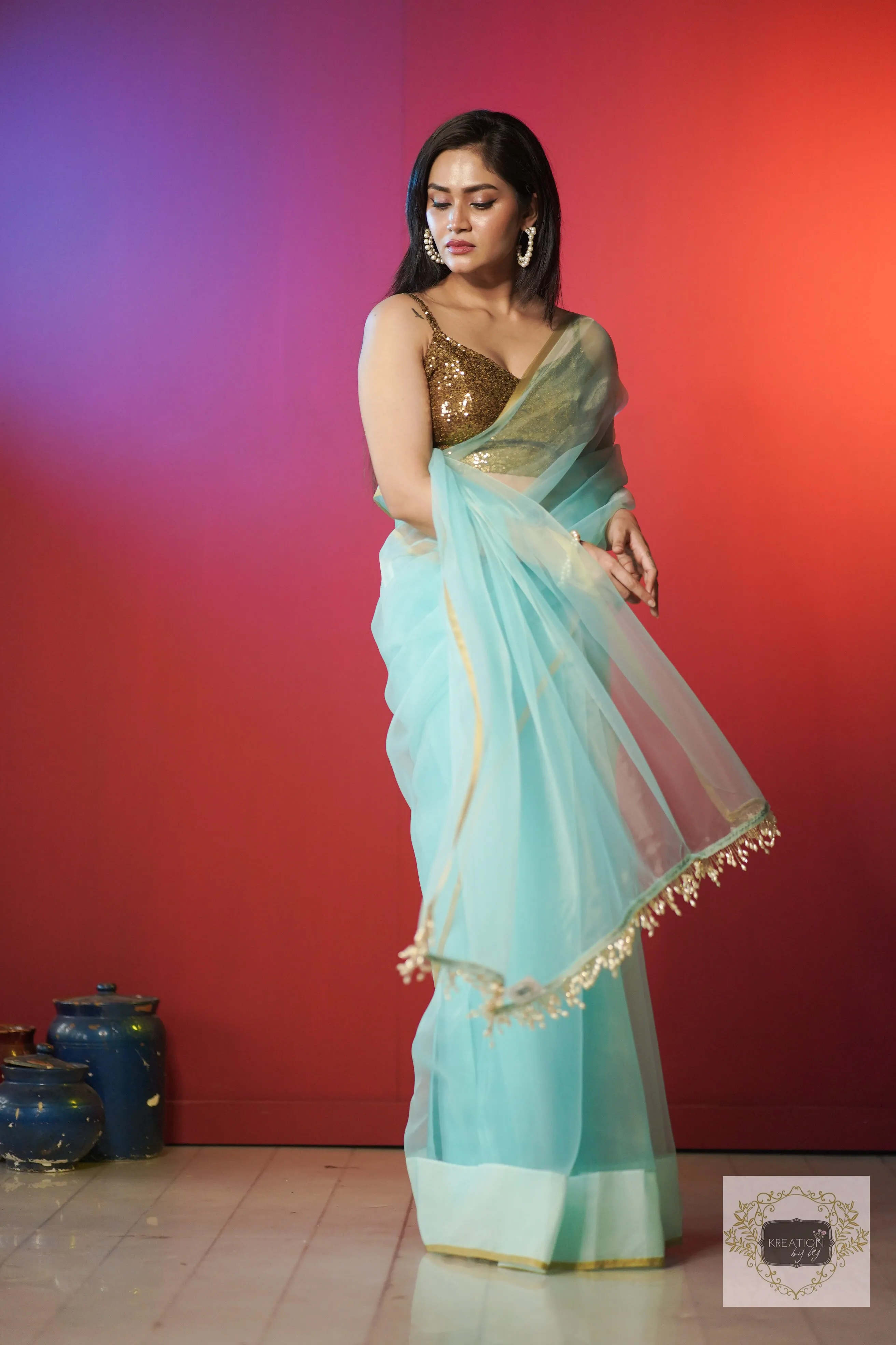 Ice Blue Organza Saree With Handmade Tassels On Pallu